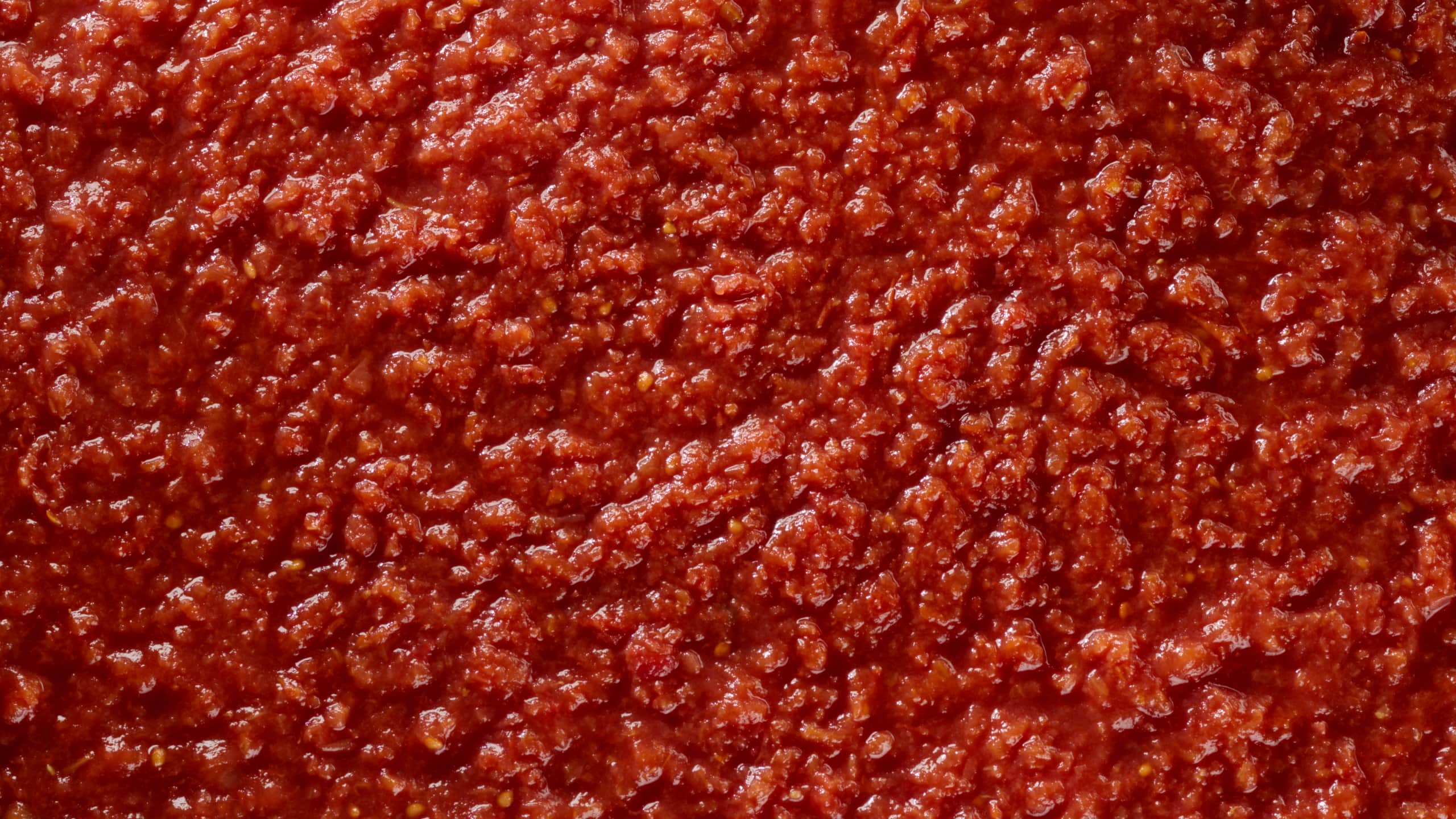 Close-up texture of Mutti chopped tomatoes