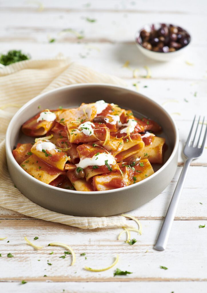 Paccheri with tomato, salt cod, stracciatella and lime