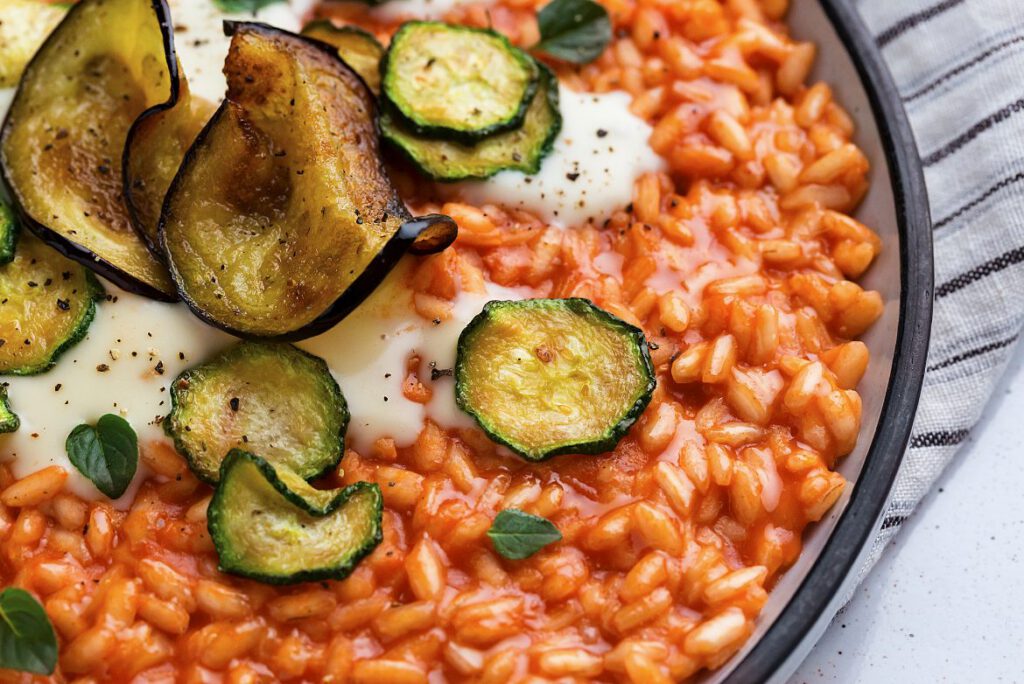 Tomato Risotto with Parmesan Fondue and Fried Veggies