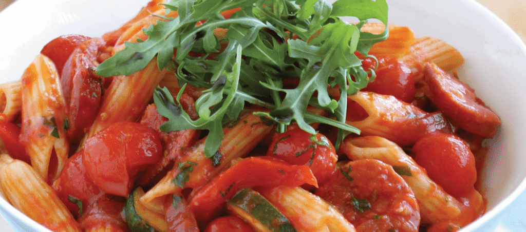 Penne with chorizo, zucchini & cherry tomatoes