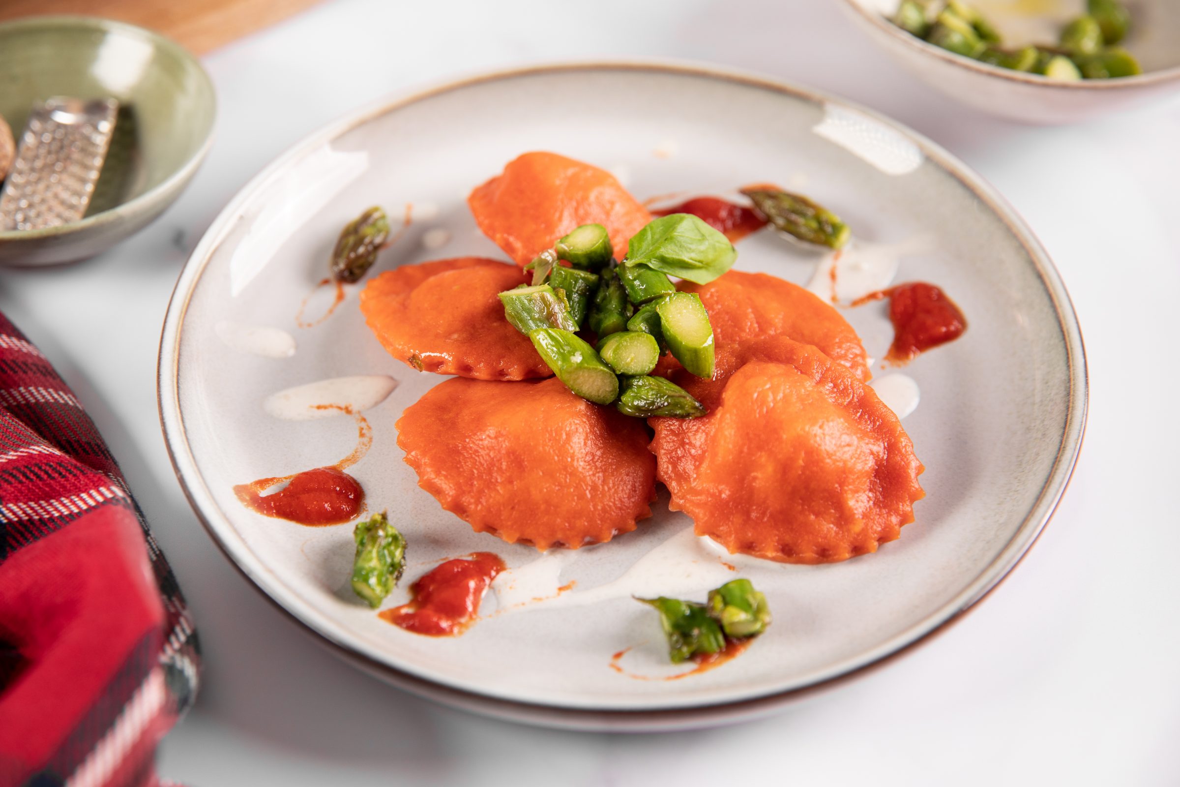 Tomato ravioli with soft cheese and salmon