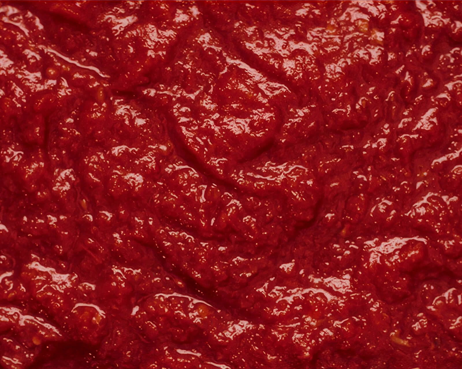 Close-up texture of Mutti chopped tomatoes