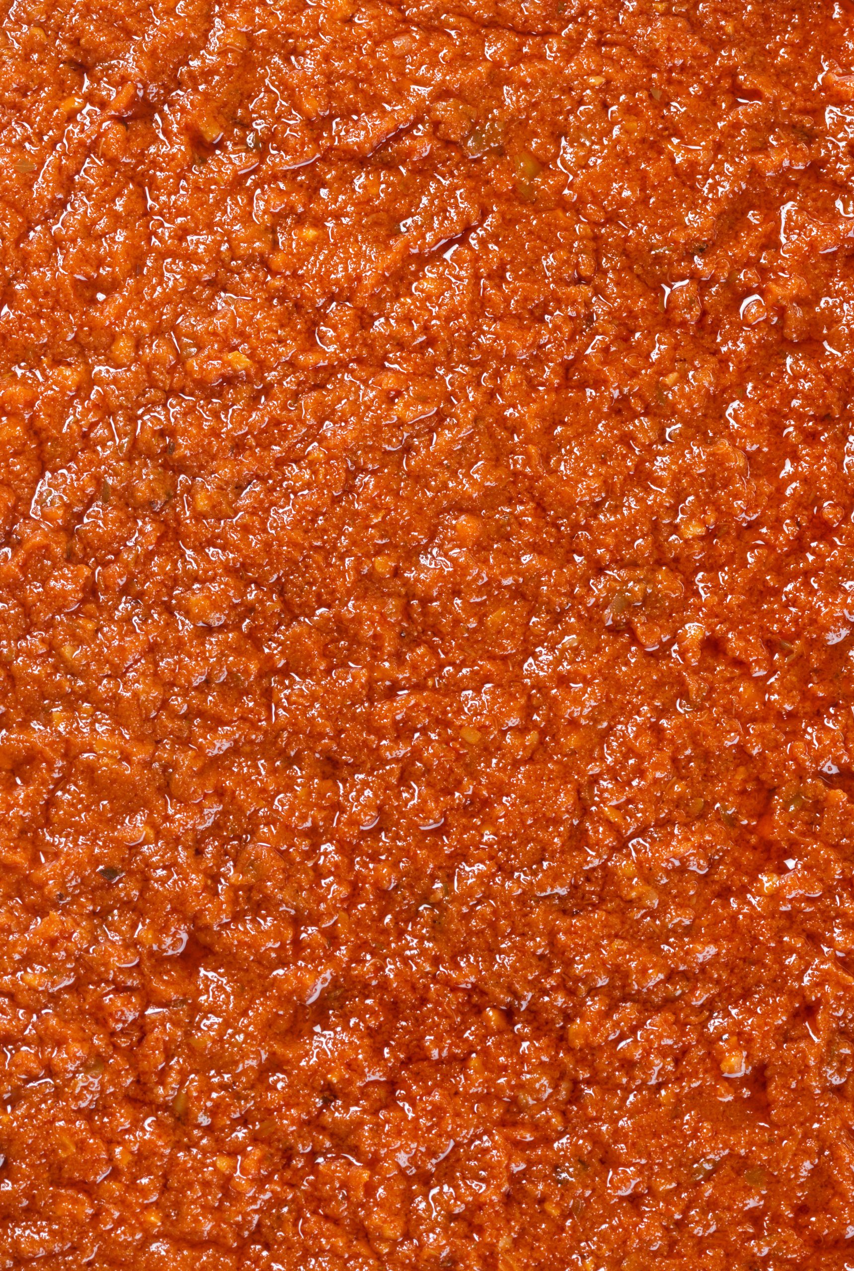 Close-up texture of Mutti red tomato pesto