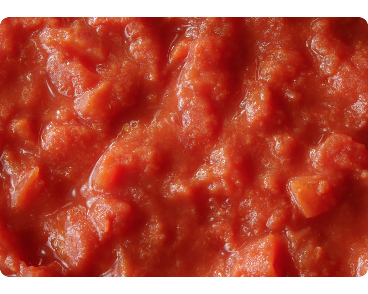 Close-up texture of finely chopped tomatoes