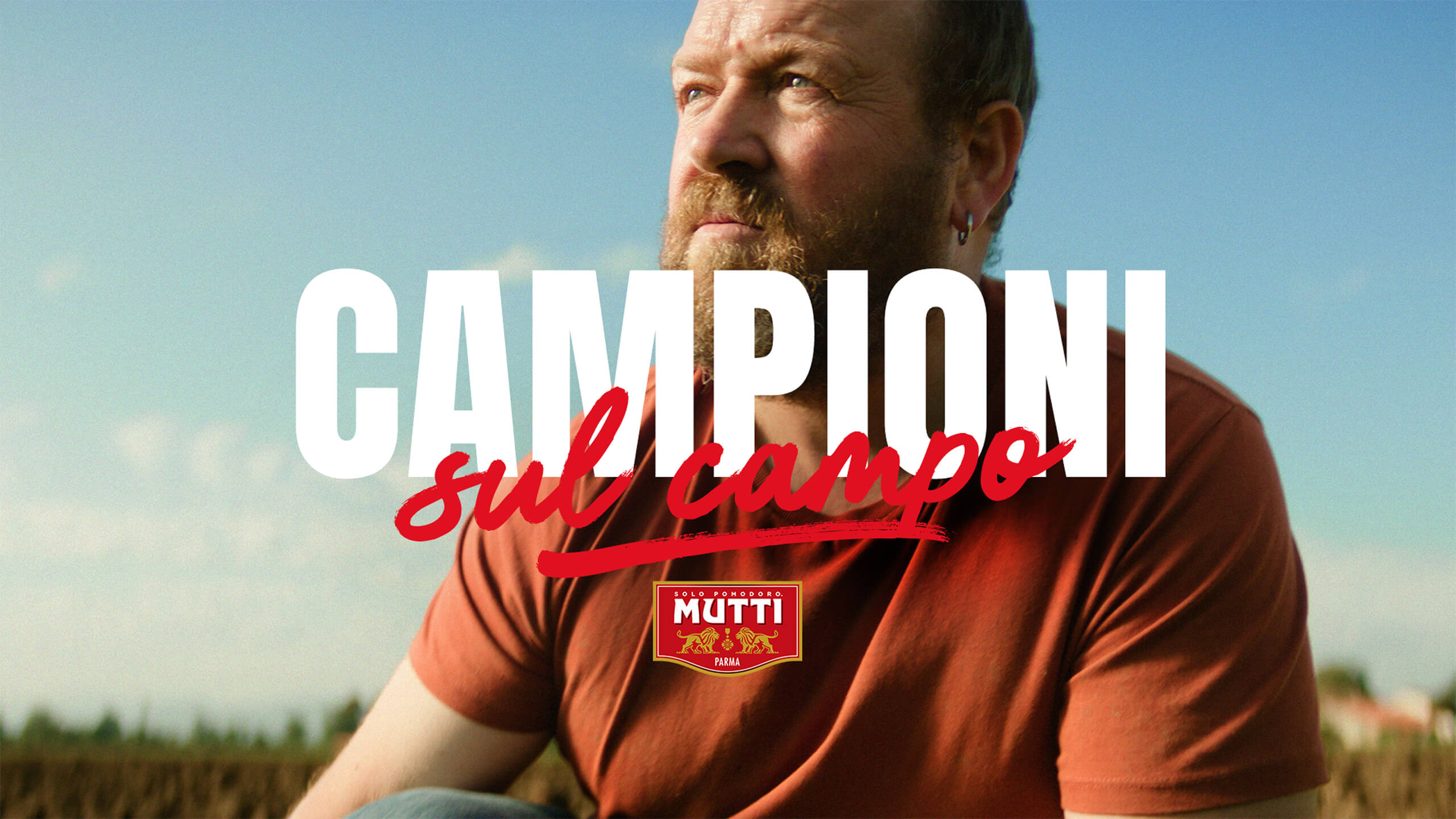 Mutti farmer portrait in a field for the Campioni sul campo campaign