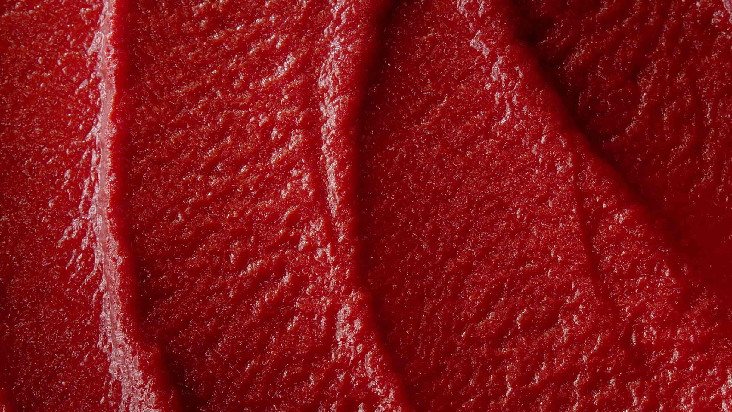 Close-up texture of Mutti double concentrated tomato paste