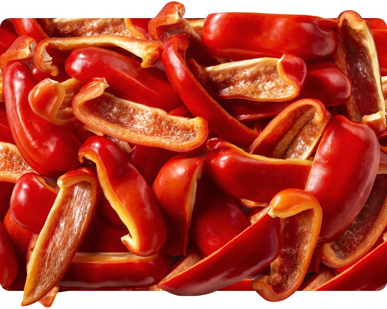 Sliced red bell peppers with charred edges