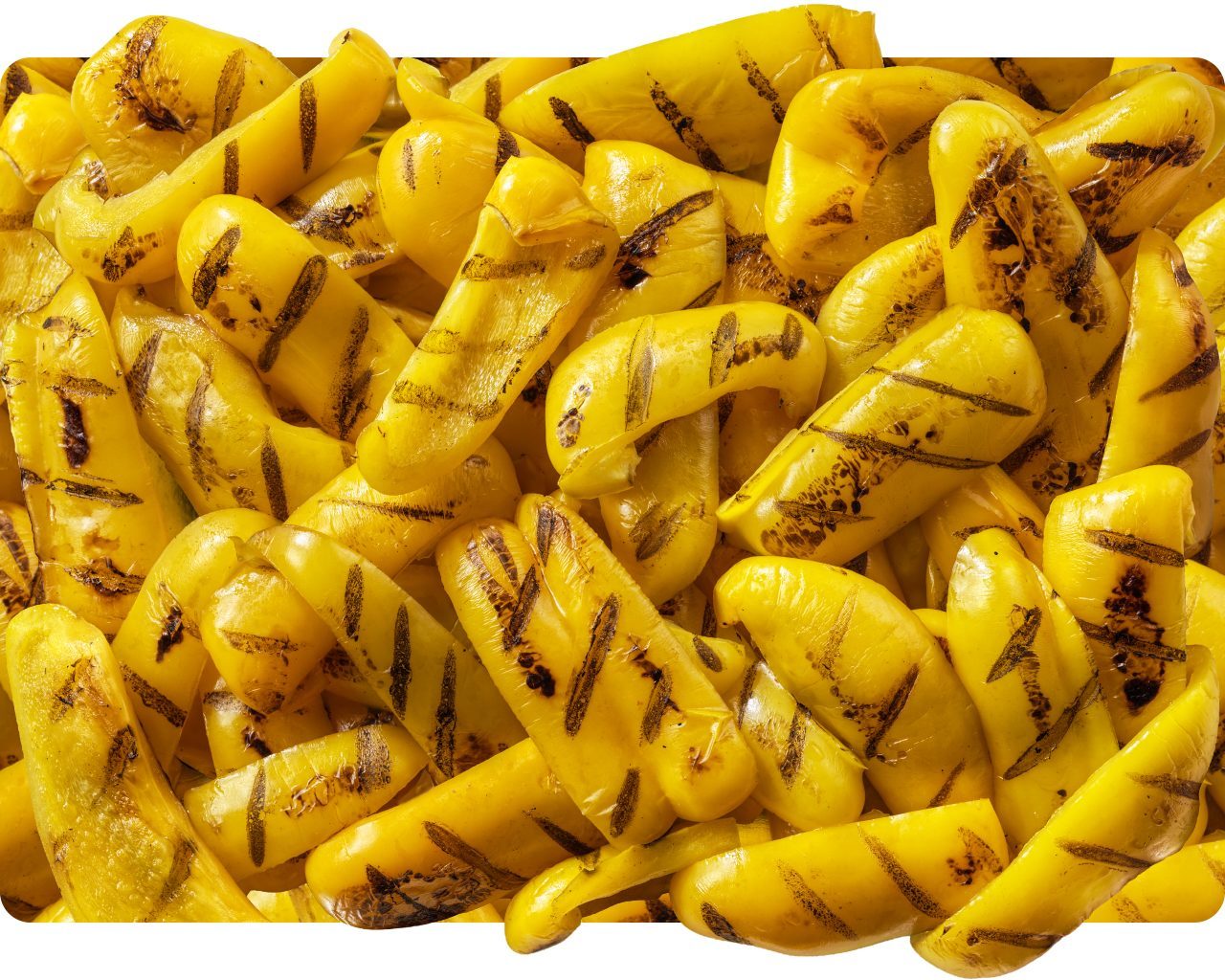 Grilled yellow pepper strips with char marks
