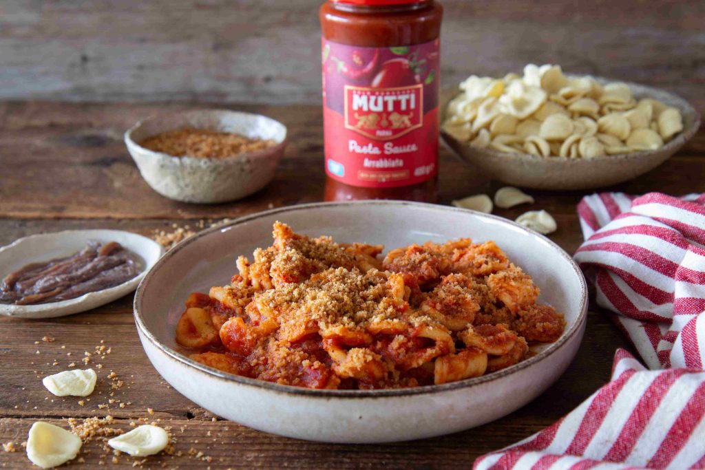 Orecchiette pasta with spicy tomato sauce, anchovies and crispy breadcrumbs